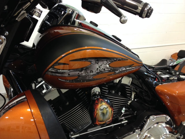 tribal flares decal on gas tank of motorcycle